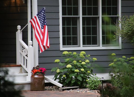 American flag on outside staircase