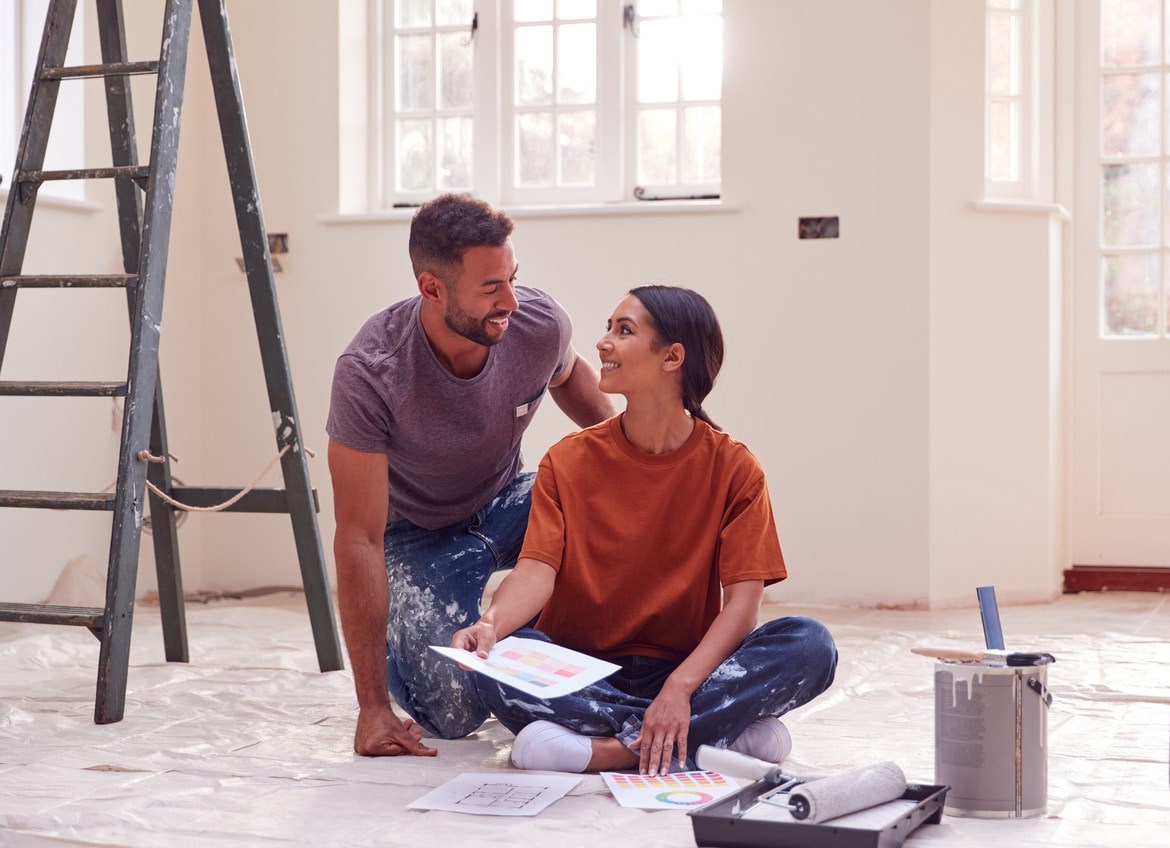 Couple making home improvements after doing a cash-out refinance