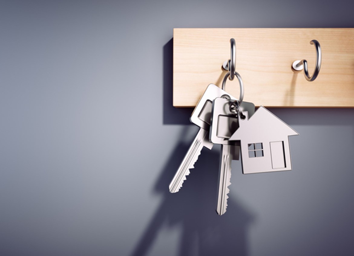Keys with house keyring on key rack