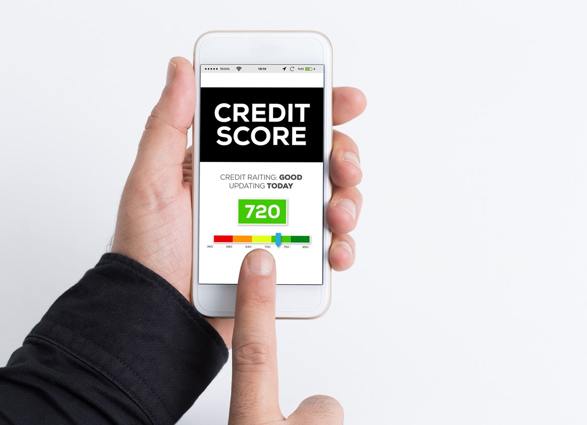Person using phone app to check credit score