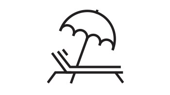 Outline of beach chair under umbrella